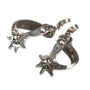 Vintage silver spurs with intricate engravings and star details on transparent background.