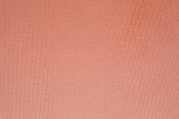 Salmon red canvas fabric texture photograph. Blank background. 