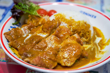 A delicious curry fried chicken chop rice in a Hong Kong tea restaurant