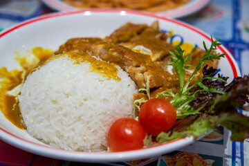 A delicious curry fried chicken chop rice in a Hong Kong tea restaurant