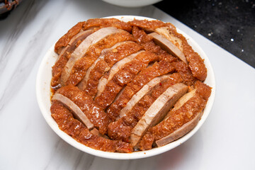 A bowl of fragrant and delicious traditional Chinese dishes, taro braised pork