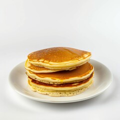 A stack of pancakes resting on a white plate