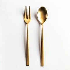 Gold shiny fork and spoon isolated on white background.
