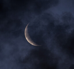Obraz na płótnie Canvas Waning Crescent Moon and clouds