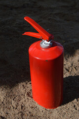 Obraz premium Red fire extinguisher.