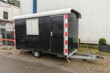 black and white mobile construction wagon