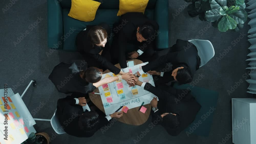 Poster top down view of business people hands making scrum task board to manage workflow in workplace. dive
