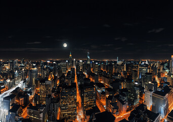 Explore the entrancing ambiance of "metropolises illuminated at night".