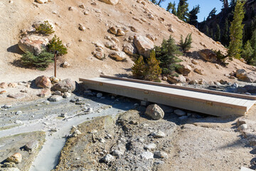 a beautiful hiking path through the Bumpass hell valley in the lassen volcanic national park,...