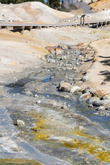 colorful hot water stream into the Bumpass hell at lassen volcanic national park, california