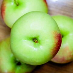Apples. A photo suggesting apples with a blur effect, useful for abstract design elements.