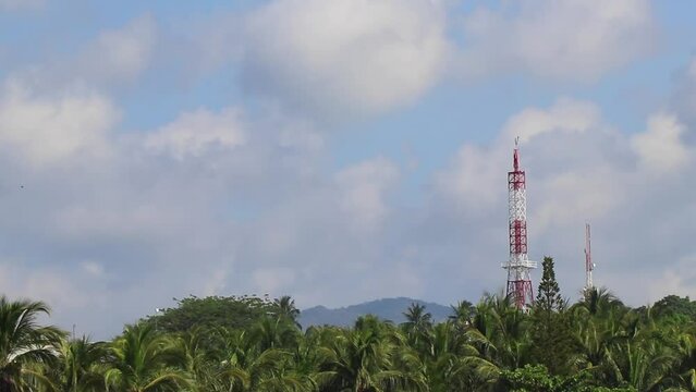Red white 5G tower radiation in Puerto Escondido Mexico.
