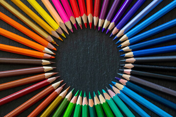 Color pencils in a circle - Powered by Adobe