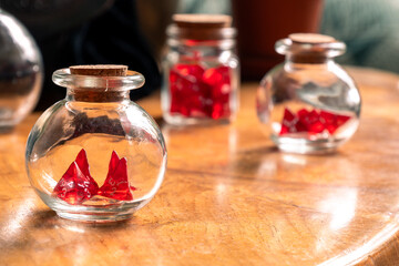 A Trio of Glass Jars with Red Dice: A Vintage Tabletop Display