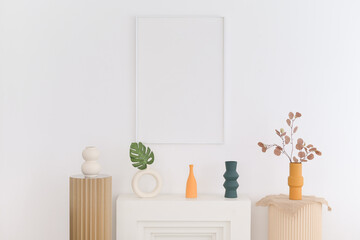 white wall with blank art frame in living room. interior modern design.