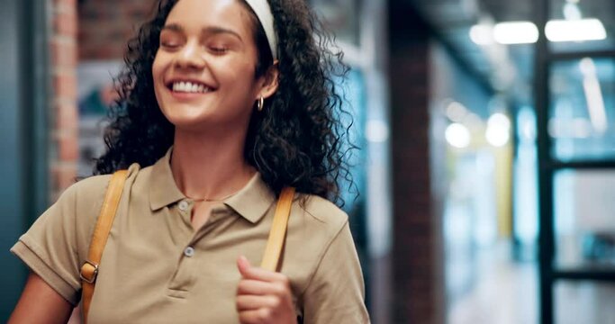 Happy, backpack and student in a university classroom with confidence and happy from learning. College library, master candidate and smile at a school with education, scholarship and book bag