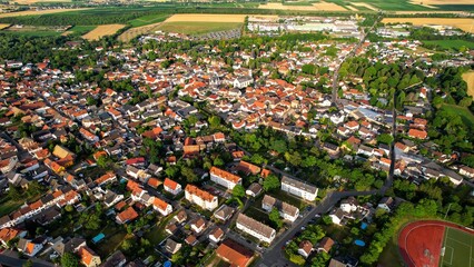 Aerial view around the old town of the city Sprendlingen on a sunny day in Germany.
