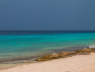 Tropical beach with turquoise water and white sand in Curaçao