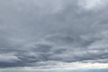 Obraz premium Dark, gloomy overcast clouds gray and white