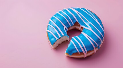 Bitten blue iced donut with white stripes on a pink background. Close-up of a delicious pastry. Ideal for foodies and sweet lovers. AI