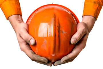 A man's hands hold a builder's helmet on a white or transparent background. Close-up of a builder's hands holding an orange helmet. Graphic design element on the theme of construction.