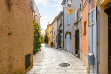 Picturesque streets of stone houses in the hilltop village of Gassin, France, in the...