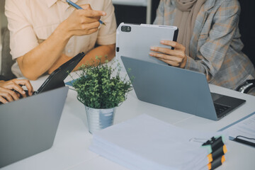 Finance manager meeting discussing company growth project success financial statistics, professional investor working start up project for strategy plan with document, laptop and digital tablet.