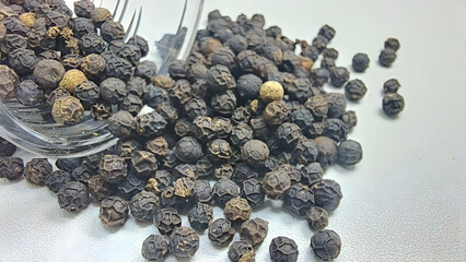Obraz premium close up of pile of dried black pepper seeds