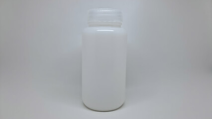 isolated white plastic bottles, refillable bottles, medicine containers