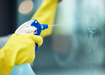 Closeup, window or cleaning or gloves with spray bottle in home, soap or chemicals for hygiene....