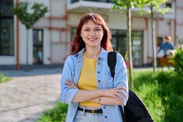 Portrait of young female college student outdoor