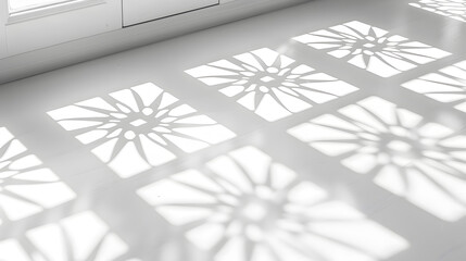 White background with shadow of mandala pattern, abstract light and shadows on white wall