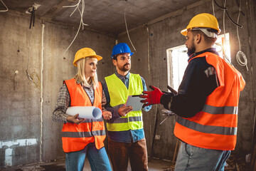 Construction team planning a building blueprint project on site with collaboration for architect...