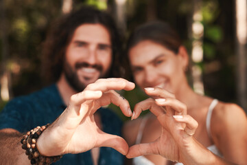 Couple, hands and heart with smile, happy and love for together, bonding and romance in outdoor....