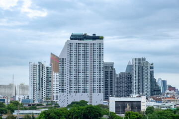 City background with urban residence and business building in Bangkok