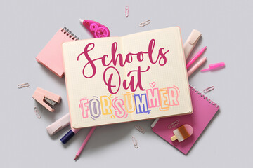 Composition with blank notebook and different school stationery on light background