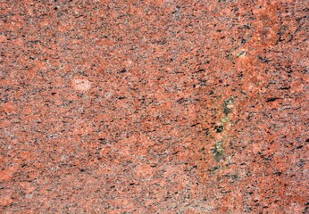 Polished granite background texture - the rock is 1.7 billion year