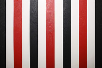 Vertical red and white stripes with one black stripe on a textured background