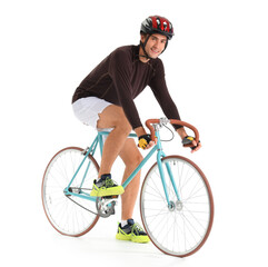 Obraz premium Young male cyclist riding bicycle on white background