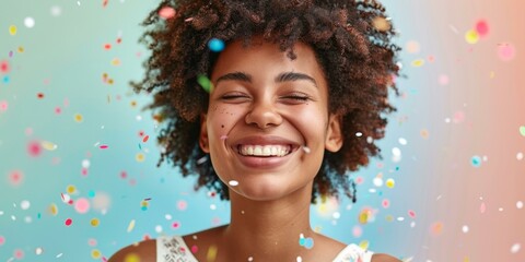 Joyful young biracial woman celebrating with colorful confetti, expressing happiness in festive atmosphere, vibrant moments captured in lively photograph. - Powered by Adobe