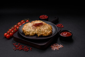Delicious fried minced chicken cutlets with salt, spices and herbs
