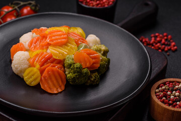 Delicious fresh vegetables broccoli, cauliflower, carrots steamed with salt