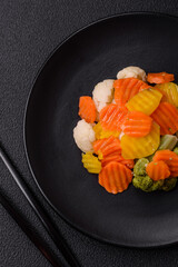 Delicious fresh vegetables broccoli, cauliflower, carrots steamed with salt