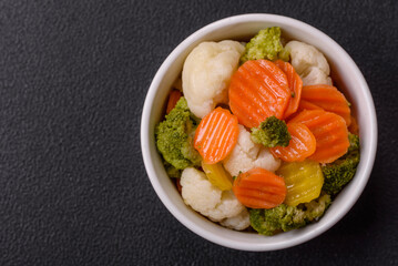 Delicious fresh vegetables broccoli, cauliflower, carrots steamed with salt