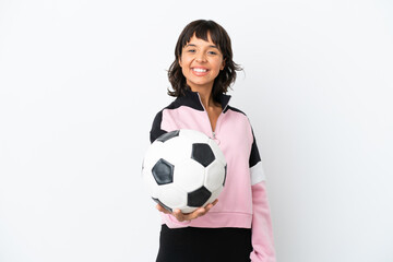 Young mixed race woman isolated on white background with soccer ball