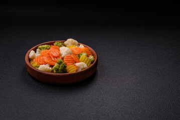 Delicious fresh vegetables broccoli, cauliflower, carrots steamed with salt