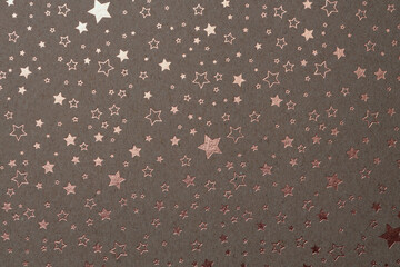 Scrapbook grain paper blank with star gold pattern wall . Texture relief copy space wallpaper...