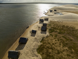 Aerial view of Parque da Dunas - Ilha das Canarias, Brazil. Huts on the Delta do Parnaíba and...