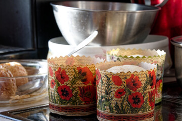 Molds for easter cakes with pattern on a kitchen table. Orthodox Easter in eastern Europe.	