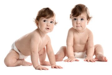 Portrait of cute twin babies on white background